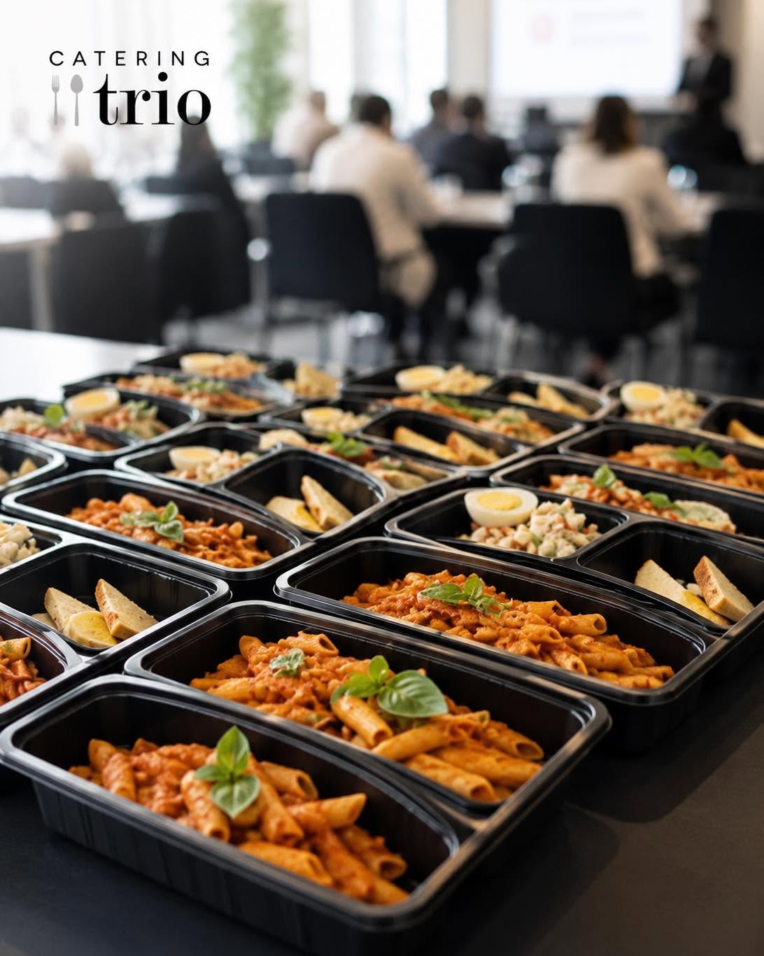 An assortment of real Catering Trio PH food trays in disposable containers
